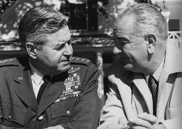 General LeMay confers with President Johnson at the president’s Texas ranch in 1962. Johnson later confided to an aide that the tough-talking general “Scares the hell out of me.” (National Archives)